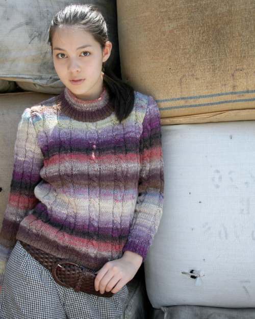 Model photograph of "Cabled Sweater"